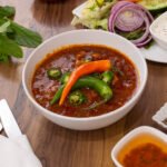 Tender boneless chicken karahi in a savory tomato-based sauce. A famous Afghan cuisine at Bamyan Place