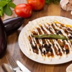 Borani Banjan: eggplant dish with tangy yogurt sauce and herbs. A famous afghan cuisine.