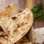 Freshly baked naan/bread with crispy edges and soft center